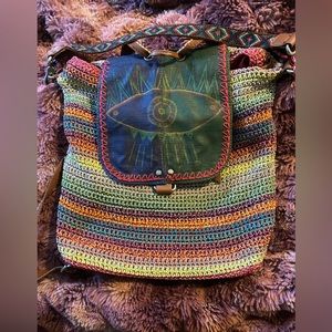 The SAK brand upcycled knit backpack.